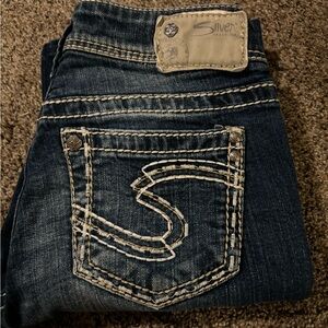 Women’s silver jeans size 27 in good condition